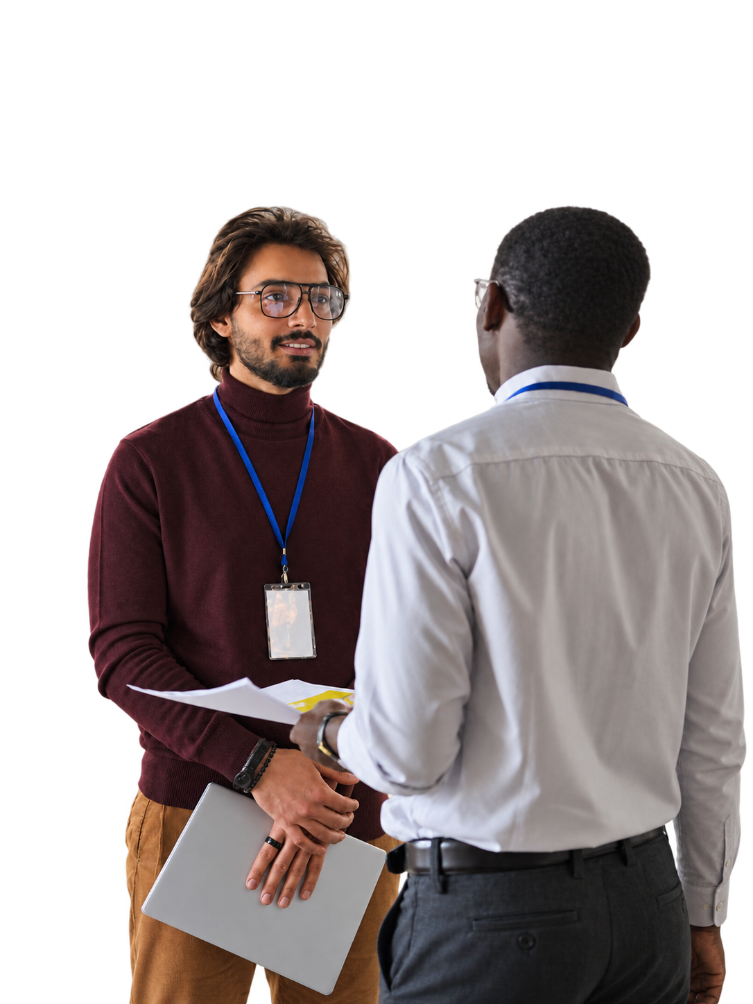 Two colleagues talking, one holding a brief