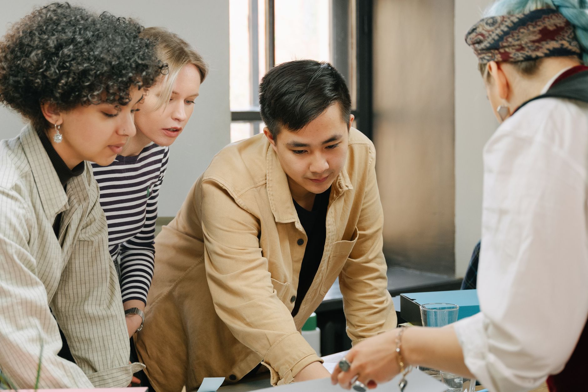 A mixed team in a working meeting
