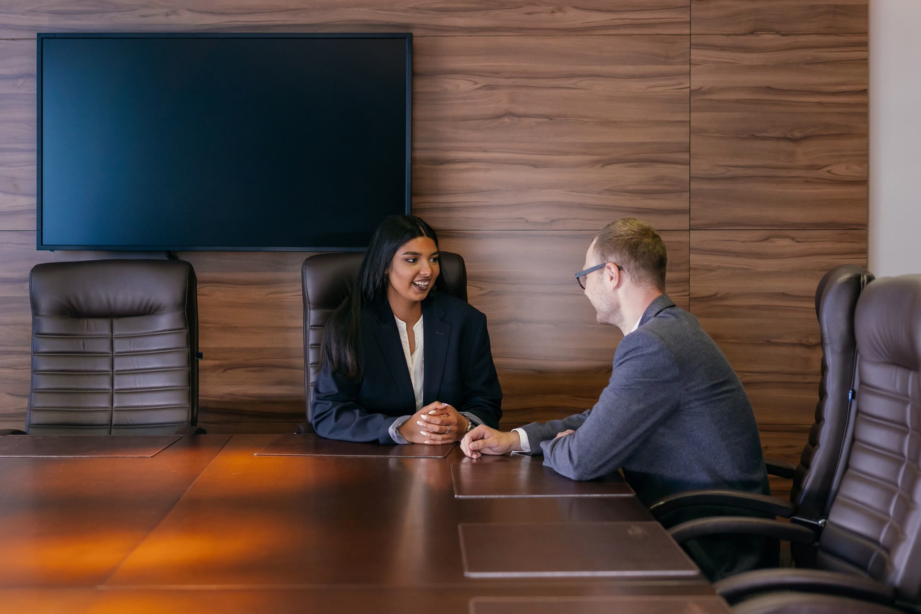 An interview taking place across a desk