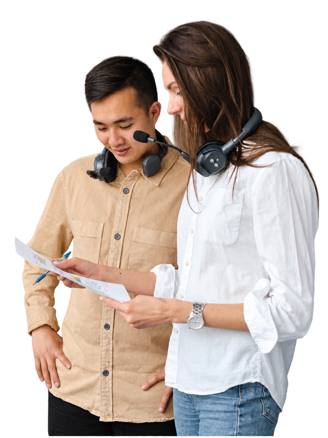 Two colleagues reading through printed figures