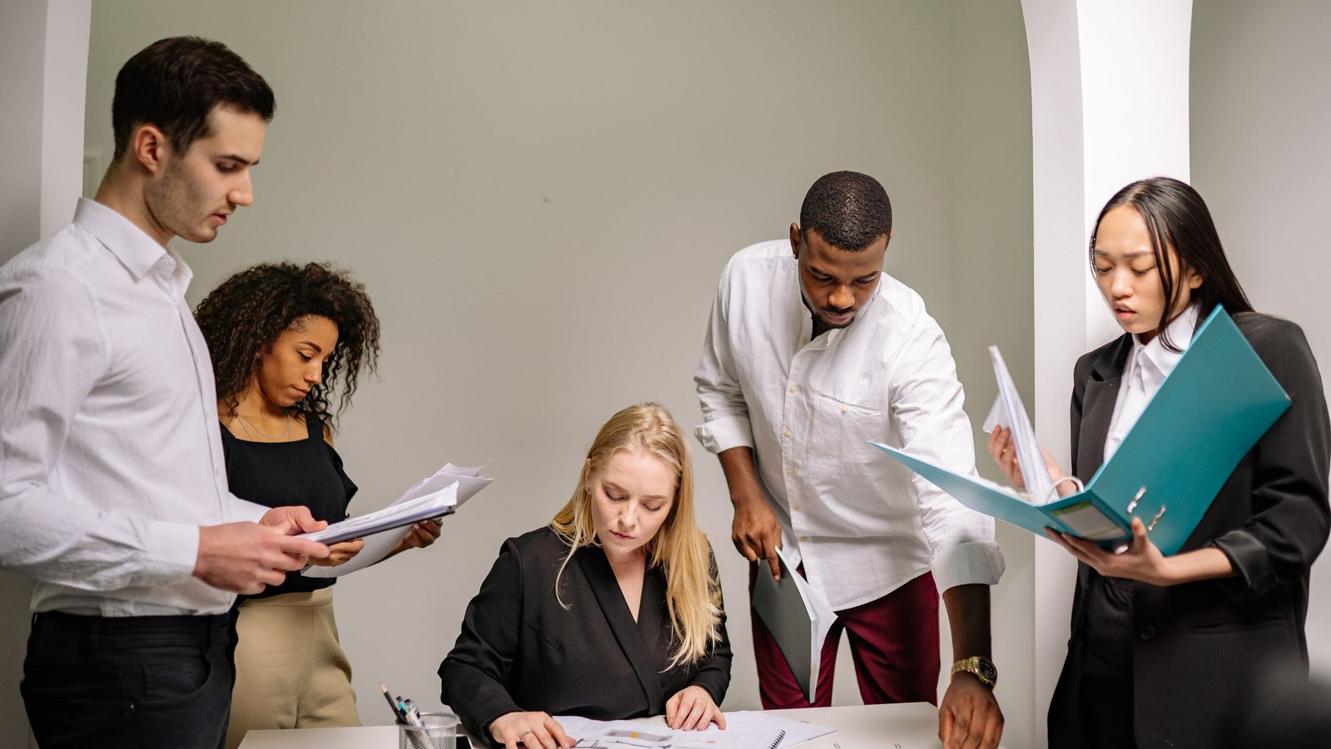 A team going through documentation together