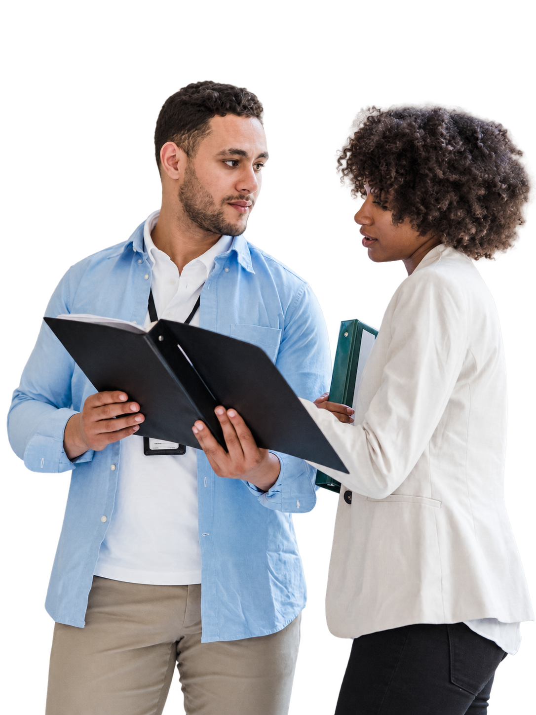 Two colleagues talking through an open folder
